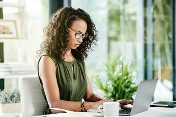 Poster - Woman, laptop and typing in office for business, planning journal and reading article review. Journalist, glasses and computer in agency for creative opportunity, publishing project and trending news