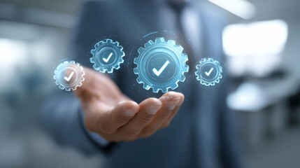 Poster - Digital gears with checkmarks held in a hand.