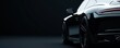 © Aris Suwanmalee - Sleek black sports car in low light, highlighting its elegant design and modern features.