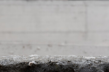 Fototapete - Stone table. Concrete stone display empty copy space with blurred background. Stone table copy space. Stone concrete counter for product placement