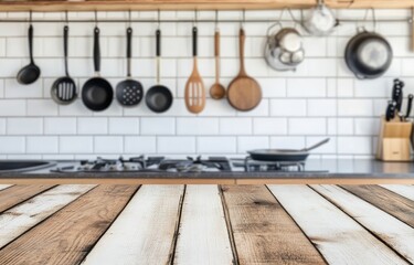 Fototapete - Wooden kitchen table top, blurred background of a modern kitchen with hanging utensils and white brick wall