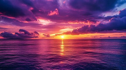 Poster - Vibrant sunset over calm ocean; colorful cloudscape reflects on water surface.