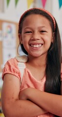 Poster - Face, smile and child in class for learning, education or youth development. Portrait, happy girl and confident kid in school with arms crossed for growth, scholarship or elementary student in Spain
