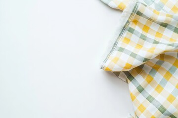 Leinwandbilder - Checkered cloth napkin on white background  Folded and draped  Yellow and green squares