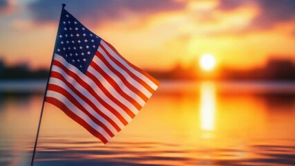 Poster - An American flag submerged in water at sunset
