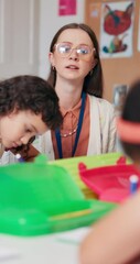 Poster - Help, teacher and woman in school, education and conversation with advice, teaching and talking. Person, kids and employee in classroom, discussion and learning with academic growth and assessment