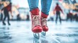 © Ilja - Woman in Red Ice Skates on an Ice Rink with a Blurred Background of People and Festive Decorations