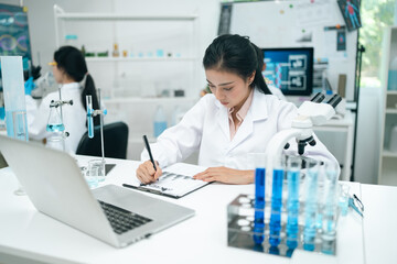 Wall Mural - medical science and technology professionals working in a laboratory research environment where scie