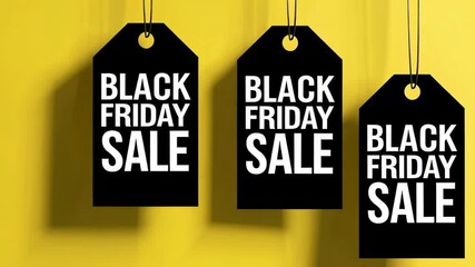 Poster - Multiple black tags with the words black friday sale in white letters, hanging against a vibrant yellow backdrop, creating a striking visual representation of the shopping event