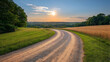 © mur - Serene Sunset Over Rolling Hills and Winding Country Road