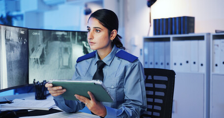 Poster - Security guard, watching and woman with tablet, cctv screen or footage in night shift for video surveillance. Camera, monitor or safety person with communication in control room for protection