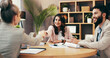 © KayContri01/peopleimages.com - People, lawyer and handshake in office for welcome, legal agreement and thank you in meeting. Attorney, client couple and shaking hands in law firm for negotiation, contract renewal and introduction