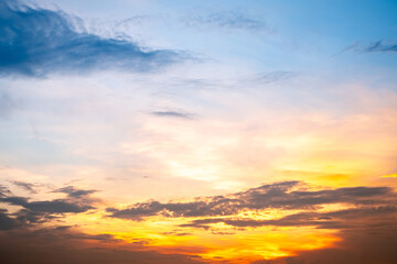 Wall Mural - beautiful , luxury soft gradient orange gold clouds and sunlight on the blue sky perfect for the bac