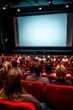 © Ronnayut - Red chairs fill the cinema, creating a vibrant atmosphere despite the empty screen.