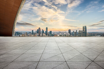 Fototapete - Empty stone floor and modern city building skyline during sunset in Chongqing. Urban landscape background.