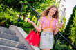 © deagreez - Portrait of attractive charming fashionista girl wear stylish clothes hold packages weekend outdoors outside
