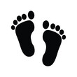 © Tanjila - Stylized footprints in black represent a child's first steps or a baby