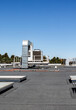 © ADDICTIVE STOCK - Industrial rooftop air conditioners under clear blue sky