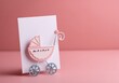 © serdon - The card is pink and intended for a girl, featuring a background suitable for newborns, and can be used for baby shower invitations or birth announcements with a flat lay design and space for text