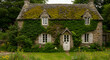 © Herlin - Enchanting Stone Cottage With Mossy Roof And Lush Ivy Facade In Summer