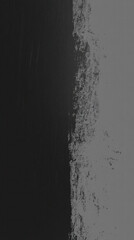 Poster - A black and white photo of a wall with a white line dividing it. The wall appears to be painted with a brush, giving it a textured and rough appearance