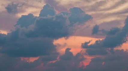 Wall Mural - sky transform from the first light of dawn to a radiant sunrise, with beautiful clouds painting the 