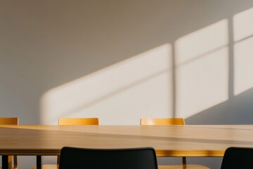 Aufkleber - A clean white table is captured from above, featuring subtle shadows on a plain white wall, offering ample copy space on the left side for design applications