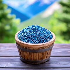 Poster - Decorative bowl filled with beautiful blue beads on a soft background adding charm to the setup