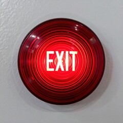 red exit sign on white wall with circular design and bright illumination