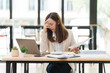 © Kritdanai - Stressed Businesswoman at Desk with Laptop