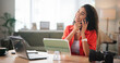 © peopleimages.com - Phone call, photographer and smile with woman in office for catalog editor, client briefing or communication. Photography review, content creation and remote worker with person and laptop at home