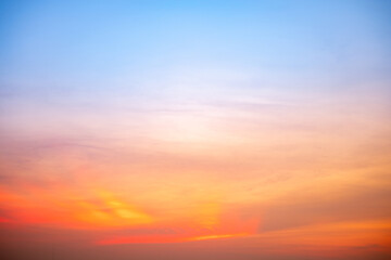 Wall Mural - beautiful , luxury soft gradient orange gold clouds and sunlight on the blue sky perfect for the bac
