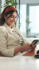 Wall Mural - Office, businesswoman and typing with smartphone for chat, online conversation and comment for joke. Break, female person and worker with mobile for application, laughing and message on social media