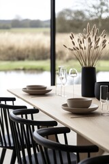 Poster - Serene dining setup featuring minimalist ceramics elegant glassware and graceful reed creating a neutral mood for a home