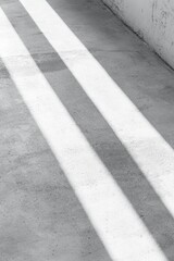 Aufkleber - Sunlight Streaming Across Concrete Floor Creating Abstract Pattern Minimalist Interior Design Idea