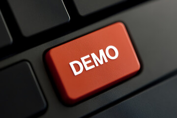 Poster - Close-up of a keyboard with a red 'DEMO' key, symbolizing trial versions and software demonstrations. Ideal for tech blogs or product reviews.