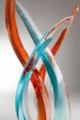 Poster - Elegant Glass Sculpture with Intertwined Orange and Blue Ribbons Artistic Design Modern Art Piece Studio Shot Smooth Background Creative Abstract Composition