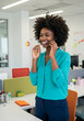 © Lari - Black woman in customer service with headset in office
