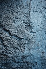 Poster - Moody Abstract Texture of Rough Blue Plaster Wall with Deep Shadows and Artistic Grit for Industrial Design and Vintage Aesthetic Photography