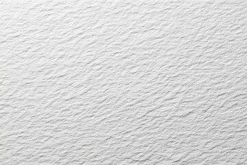 close-up of textured white paper showing intricate patterns.