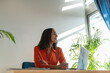 © Milles Team/Stocksy - Proud businesswoman working at office
