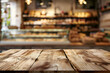 © rhmwhyni - empty wooden table blurred bakery shop background