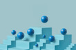 © Yaroslav Danylchenko/Stocksy - Balance blue stairs and spheres abstract geometric composition