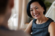 © Jovo Jovanovic/Stocksy - Financial advisor smiling at client