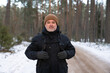 © Hernandez & Sorokina/Stocksy - Man portrait in the snowy forest