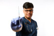 © ArvStd - Confident asian male nurse, doctor in medical rubber gloves, holding syringe with vaccine, standing white background