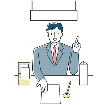 窓口で書類の記入について説明する男性