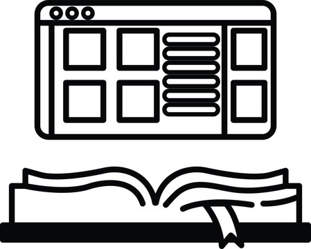 computer monitor with a book open on it