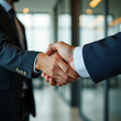 © own - businessmen handshake after a good deal.