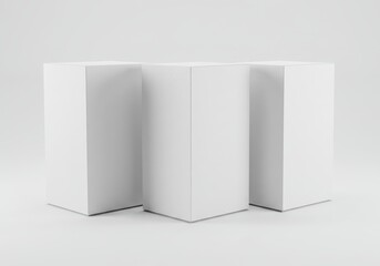 Poster - Three white rectangular prism shapes standing on a white surface in a minimalist composition